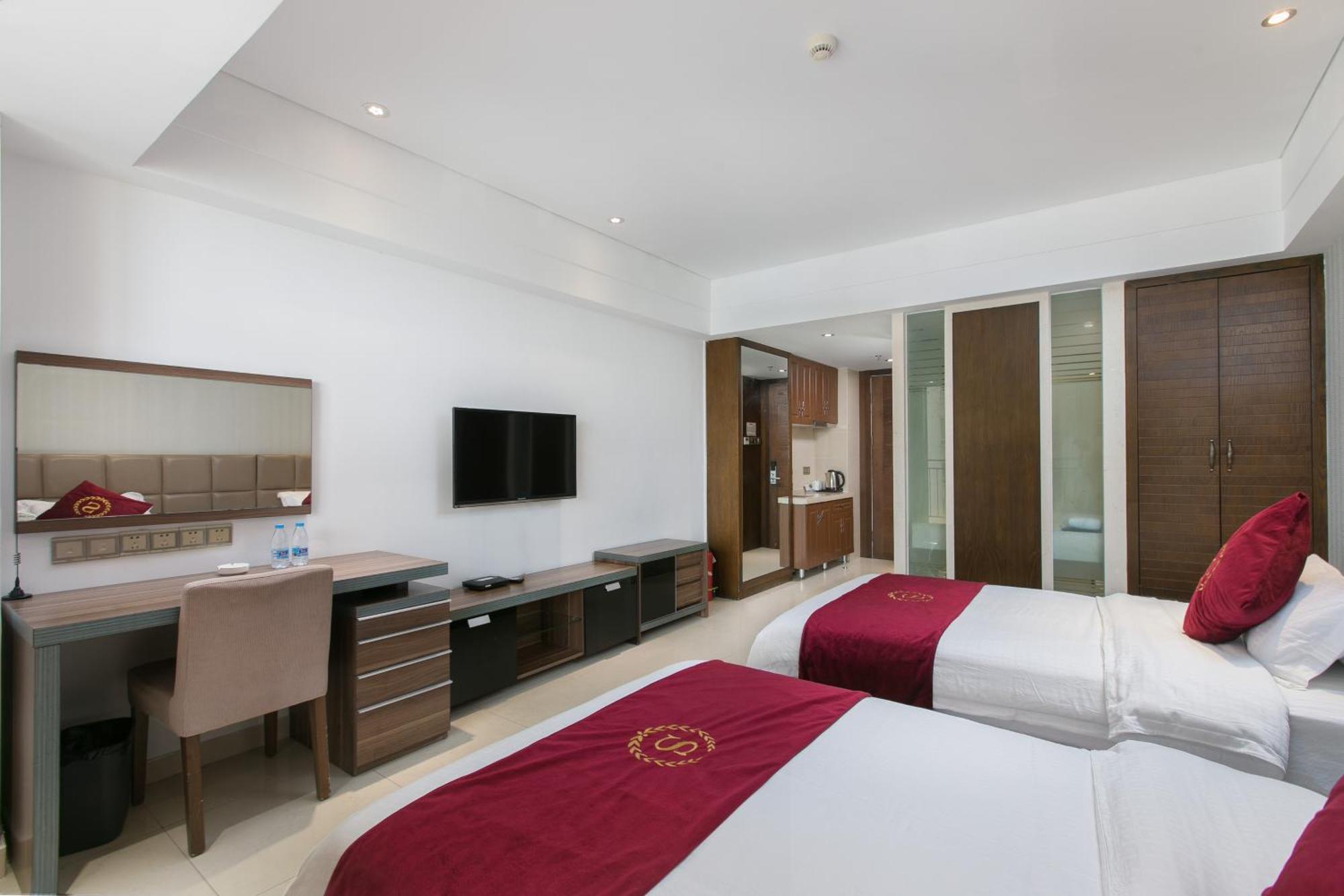 Sanya Sun And Sea Gueshouse Aparthotel Rum bild